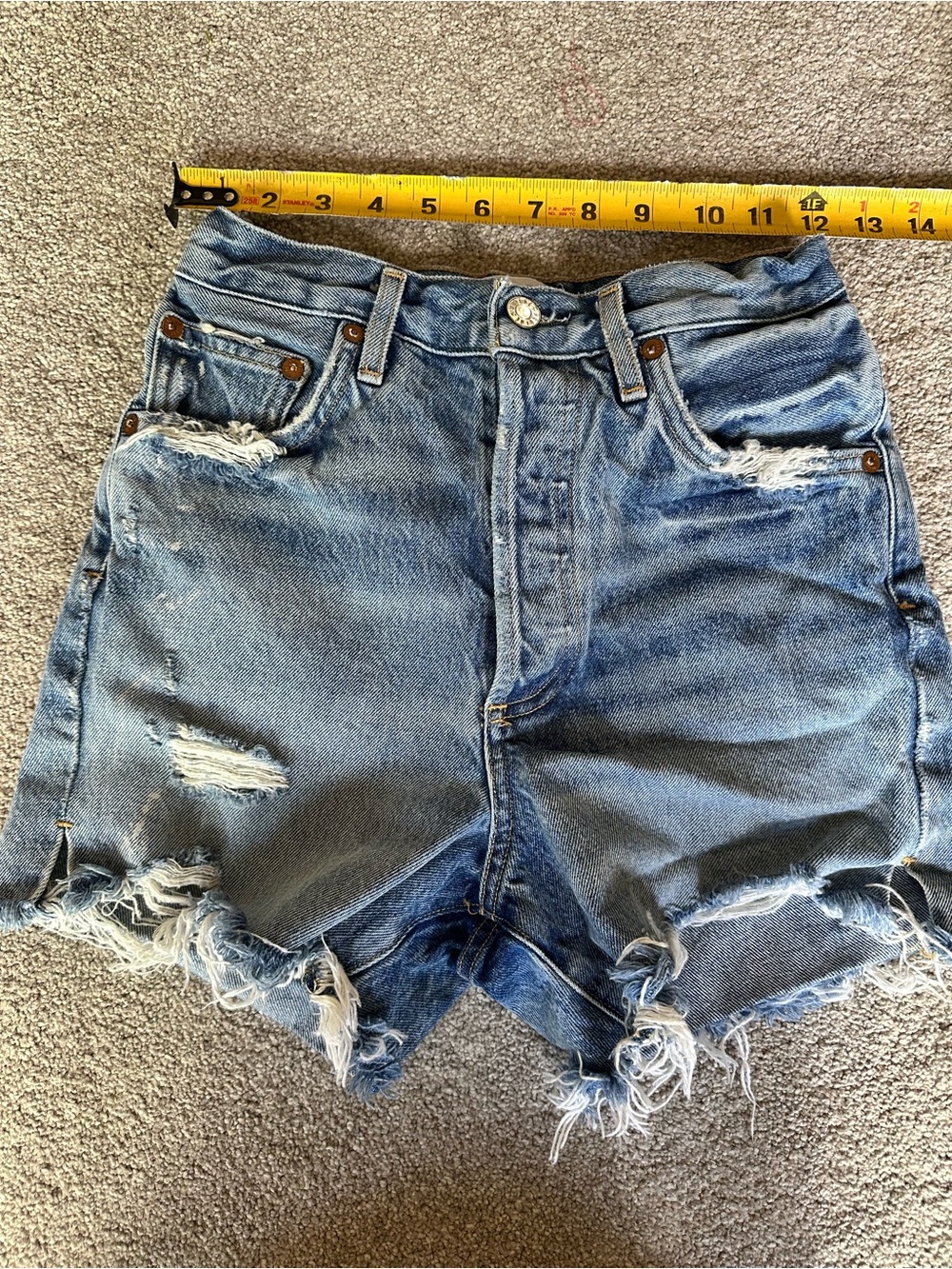 Agolde Distressed Light Blue Denim Cutoff Shorts